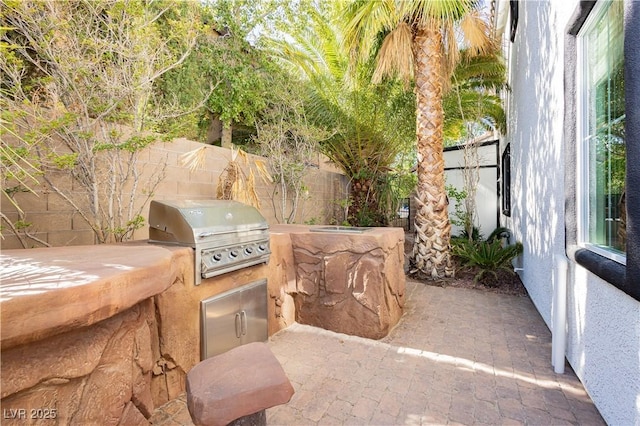 25 Blue Valley Dr, Henderson, NV 89002 - fenced backyard with a patio