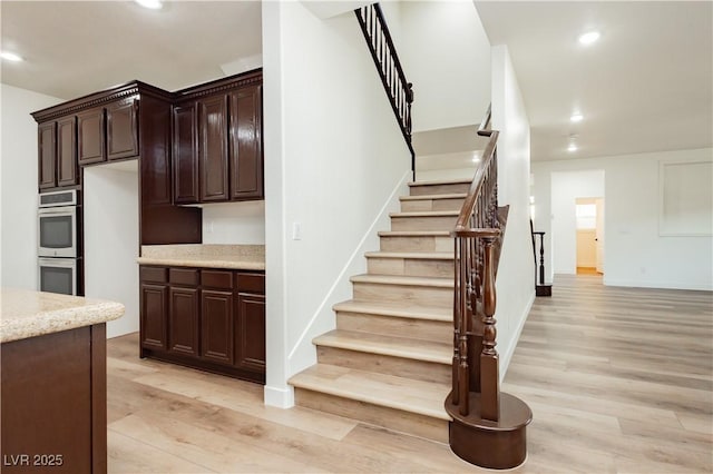 25 Blue Valley Dr, Henderson, NV 89002 - staircase featuring wood finished floors, recessed lighting, and baseboards