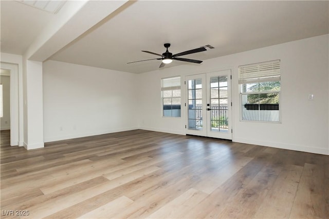 25 Blue Valley Dr, Henderson, NV 89002 - spare room featuring french doors, wood finished floors, ceiling fan, and baseboards