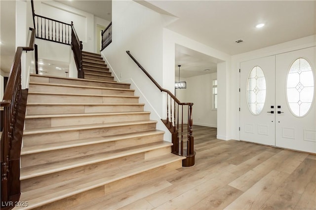 25 Blue Valley Dr, Henderson, NV 89002 - entryway with stairway, wood finished floors, baseboards, and recessed lighting