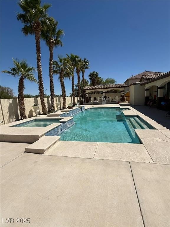 3064 Azure Bay St, Las Vegas, NV 89117 - view of pool featuring a pool with connected hot tub and a patio