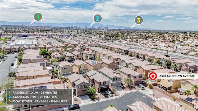 6387 Azurelyn Ave, Las Vegas, NV 89122 - aerial view of residential area with mountains