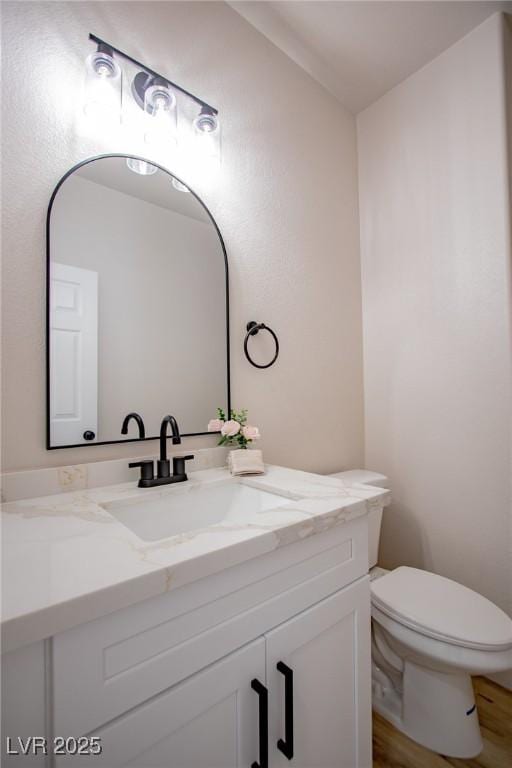 6387 Azurelyn Ave, Las Vegas, NV 89122 - bathroom featuring vanity and toilet