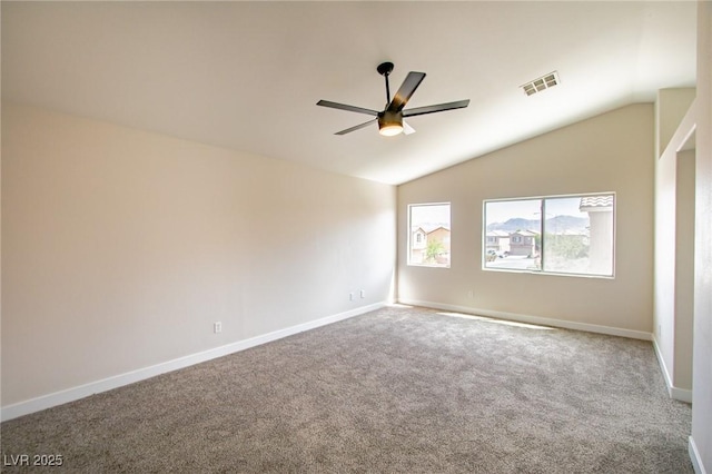 6387 Azurelyn Ave, Las Vegas, NV 89122 - unfurnished room featuring a ceiling fan, carpet, baseboards, and vaulted ceiling