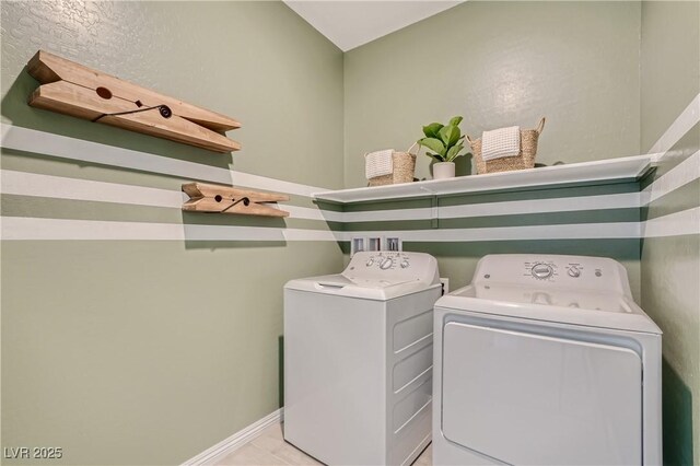 9564 Archer Peak Ct, Las Vegas, NV 89143 - washroom with washer and clothes dryer and baseboards