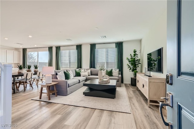 9564 Archer Peak Ct, Las Vegas, NV 89143 - living room with light wood-style floors and recessed lighting