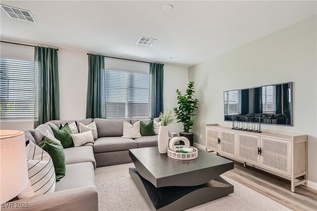 9564 Archer Peak Ct, Las Vegas, NV 89143 - living area with light wood finished floors and baseboards