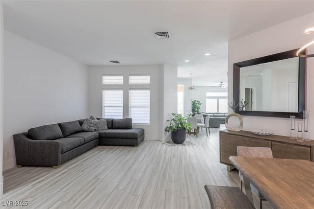 271 E Shelbourne Ave, Las Vegas, NV 89123 - living area featuring light wood-style flooring, recessed lighting, and baseboards