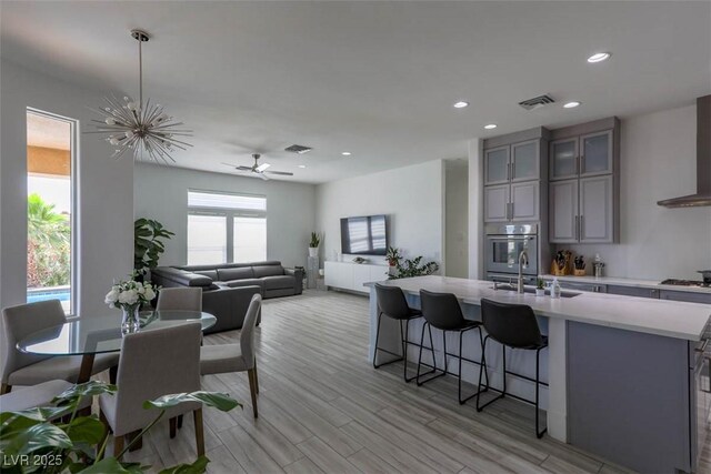 271 E Shelbourne Ave, Las Vegas, NV 89123 - dining area with light wood-style floors, recessed lighting, and a ceiling fan