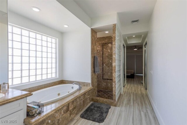 271 E Shelbourne Ave, Las Vegas, NV 89123 - full bath with a jetted tub, a stall shower, vanity, and recessed lighting