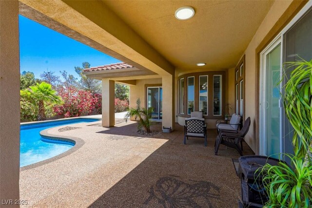 271 E Shelbourne Ave, Las Vegas, NV 89123 - view of patio / terrace with an outdoor pool
