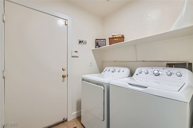 3629 Ferrell St, North Las Vegas, NV 89032 - washroom featuring separate washer and dryer and baseboards