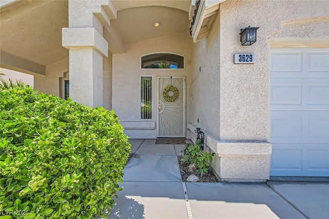 3629 Ferrell St, North Las Vegas, NV 89032 - property entrance featuring stucco siding and a garage