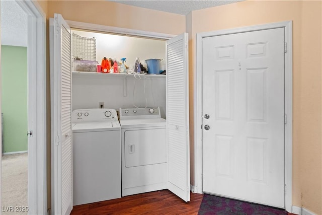 2200 Highpointe Dr Unit 202, Laughlin, NV 89029 - laundry area featuring washer and dryer and dark wood finished floors