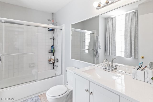 2200 Highpointe Dr Unit 202, Laughlin, NV 89029 - bathroom with toilet, combined bath / shower with glass door, vanity, and tile patterned floors