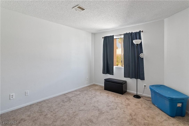2200 Highpointe Dr Unit 202, Laughlin, NV 89029 - carpeted empty room with a textured ceiling and baseboards