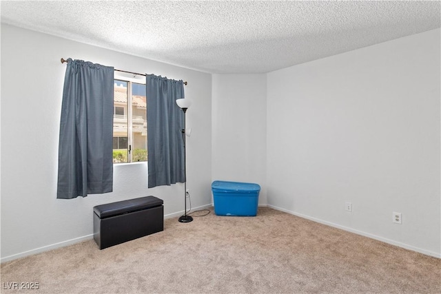2200 Highpointe Dr Unit 202, Laughlin, NV 89029 - unfurnished room featuring carpet flooring, a textured ceiling, and baseboards