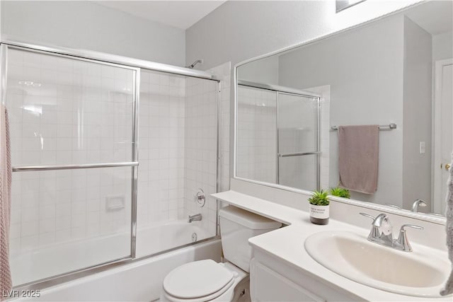 2200 Highpointe Dr Unit 202, Laughlin, NV 89029 - bathroom featuring combined bath / shower with glass door, toilet, and vanity