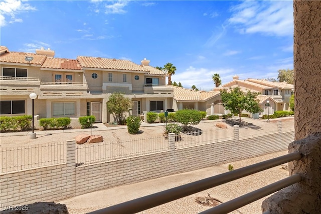 2200 Highpointe Dr Unit 202, Laughlin, NV 89029 - back of property with stucco siding and a tile roof
