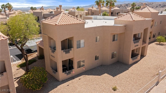2200 Highpointe Dr Unit 202, Laughlin, NV 89029 - view of building exterior featuring a mountain view and a residential view