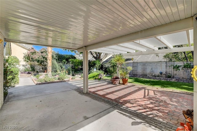 7109 Deepriver Cir, Las Vegas, NV 89129 - fenced backyard with a patio area and a pergola