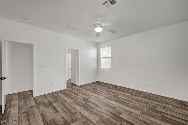 5622 Sage Pines Dr, Las Vegas, NV 89118 - unfurnished room featuring ceiling fan, dark wood-style flooring, and baseboards