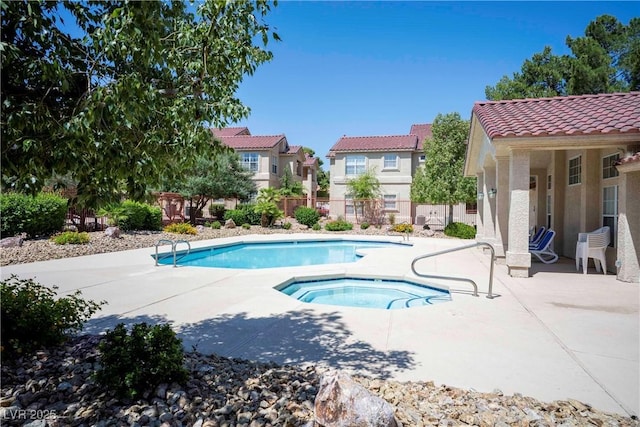 520 Arrowhead Trl Unit 1322, Henderson, NV 89015 - community pool with a hot tub, a patio area, and a residential view