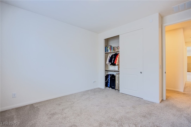 8665 Jerlyn St, Las Vegas, NV 89113 - unfurnished bedroom featuring carpet and a closet