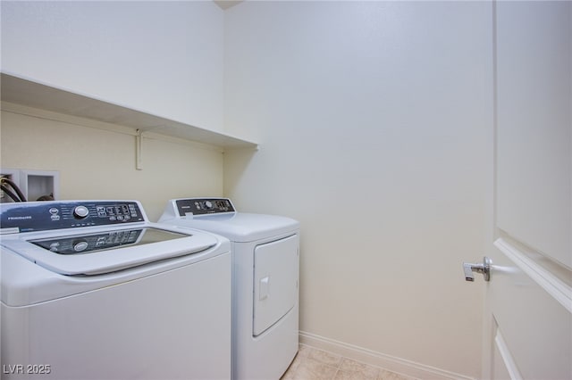 8665 Jerlyn St, Las Vegas, NV 89113 - laundry room with washing machine and clothes dryer and light tile patterned flooring
