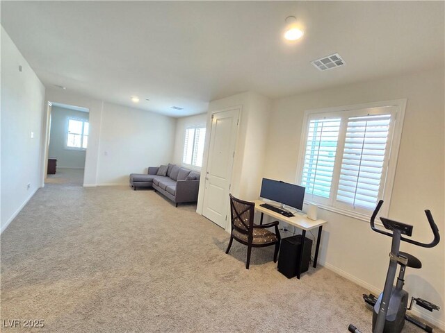 8665 Jerlyn St, Las Vegas, NV 89113 - carpeted living area with baseboards and a desk
