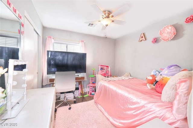 6233 Overhang Ave, Henderson, NV 89011 - bedroom featuring an office area, wood finished floors, a closet, and ceiling fan