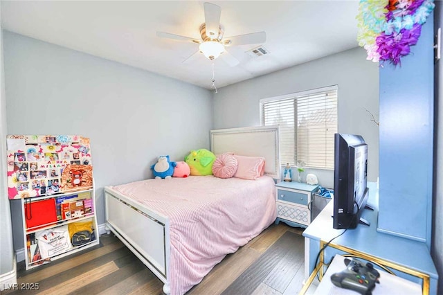 6233 Overhang Ave, Henderson, NV 89011 - bedroom with wood finished floors and a ceiling fan