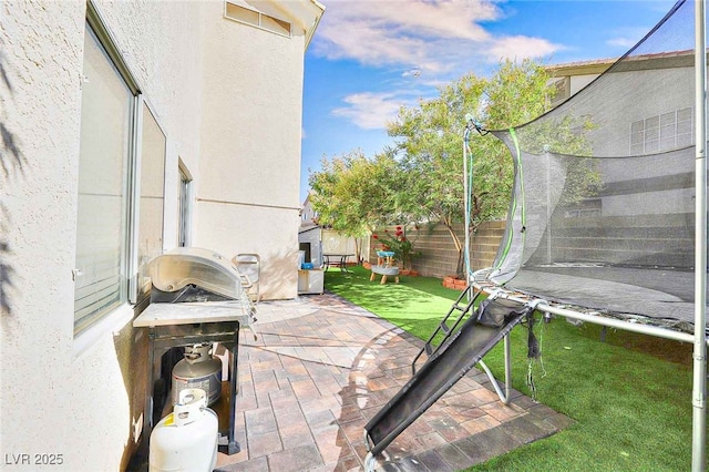 6233 Overhang Ave, Henderson, NV 89011 - view of patio / terrace featuring a trampoline