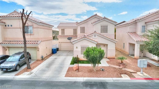 6233 Overhang Ave, Henderson, NV 89011 - view of front of property with concrete driveway, a garage, stucco siding, and a tile roof