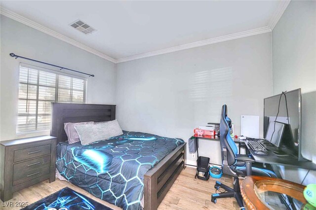6233 Overhang Ave, Henderson, NV 89011 - bedroom with wood finished floors, ornamental molding, an office area, and baseboards