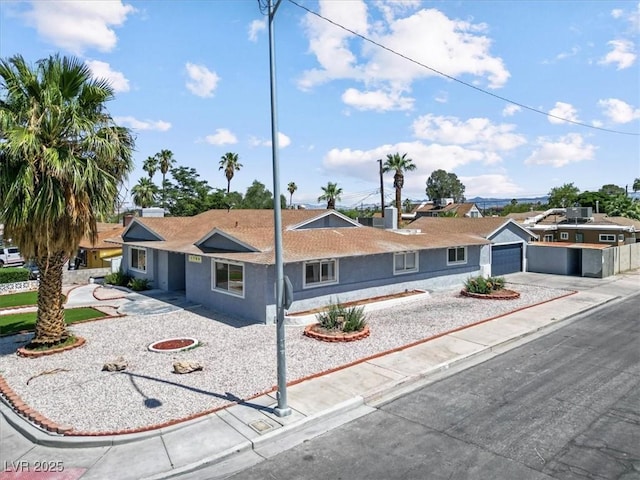 1700 E Oakey Blvd, Las Vegas, NV 89104 - ranch-style house with driveway and stucco siding