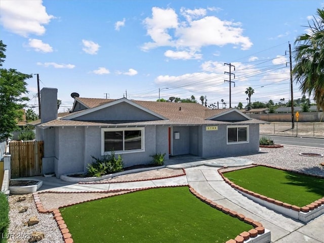 1700 E Oakey Blvd, Las Vegas, NV 89104 - ranch-style house with stucco siding and roof with shingles