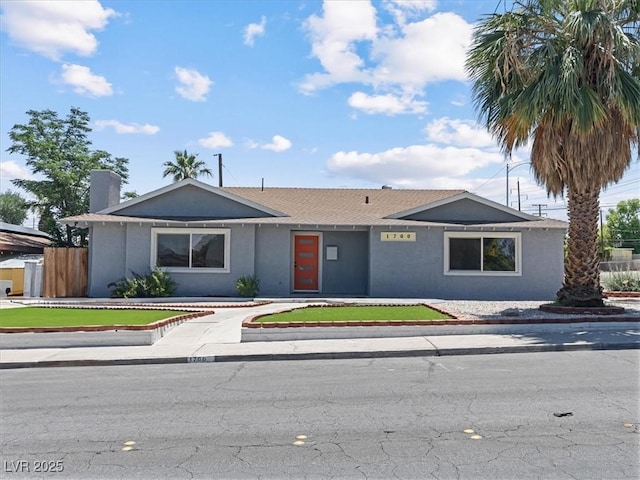 1700 E Oakey Blvd, Las Vegas, NV 89104 - ranch-style home with stucco siding and a chimney