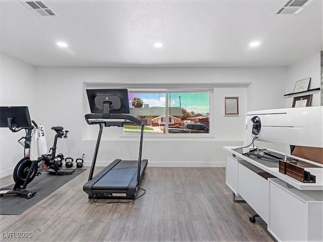 1700 E Oakey Blvd, Las Vegas, NV 89104 - workout area featuring wood finished floors, recessed lighting, and baseboards