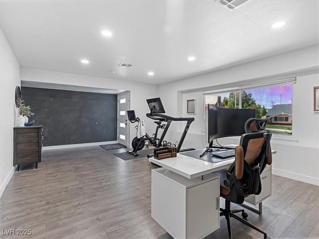 1700 E Oakey Blvd, Las Vegas, NV 89104 - home office featuring wood finished floors, baseboards, and recessed lighting