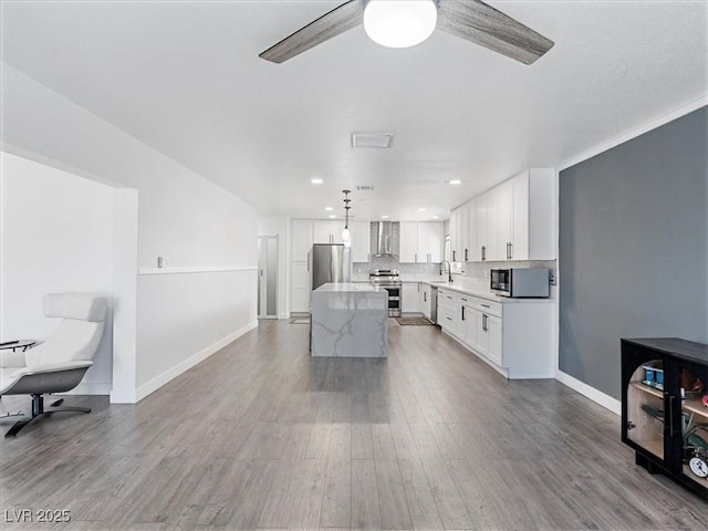 1700 E Oakey Blvd, Las Vegas, NV 89104 - living room with a ceiling fan, dark wood-style floors, baseboards, and recessed lighting