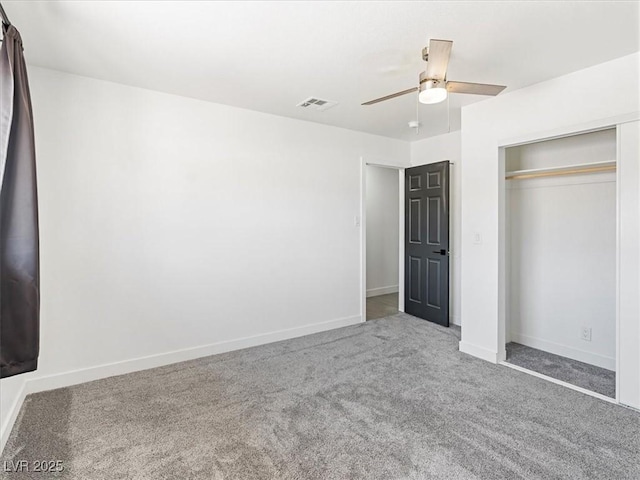 1700 E Oakey Blvd, Las Vegas, NV 89104 - unfurnished bedroom featuring carpet flooring, a closet, baseboards, and ceiling fan