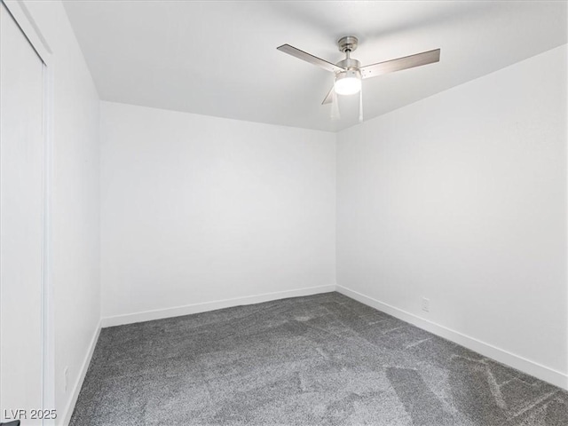 1700 E Oakey Blvd, Las Vegas, NV 89104 - empty room with dark carpet, ceiling fan, and baseboards