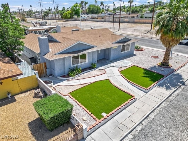 1700 E Oakey Blvd, Las Vegas, NV 89104 - view of front of property featuring stucco siding and a shingled roof