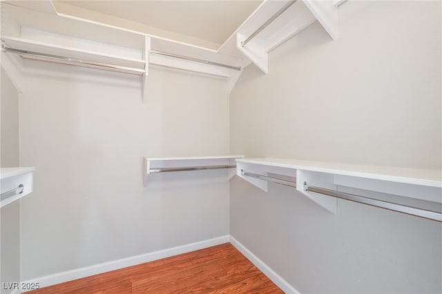2200 S Fort Apache Rd Unit 2015, Las Vegas, NV 89117 - walk in closet featuring wood finished floors