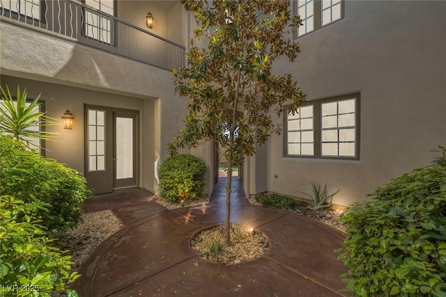 11503 Glowing Sunset Ln, Las Vegas, NV 89135 - doorway to property featuring stucco siding and french doors