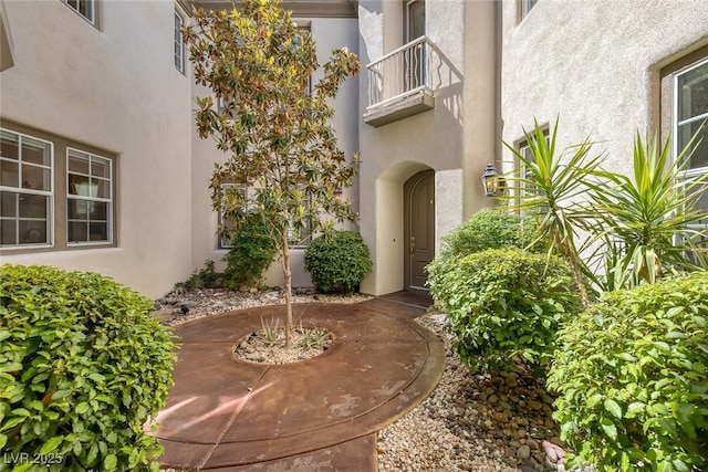 11503 Glowing Sunset Ln, Las Vegas, NV 89135 - doorway to property featuring stucco siding