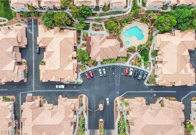 5855 Valley Dr Unit 1070, North Las Vegas, NV 89031 - aerial view of property's location featuring a pool area and nearby suburban area