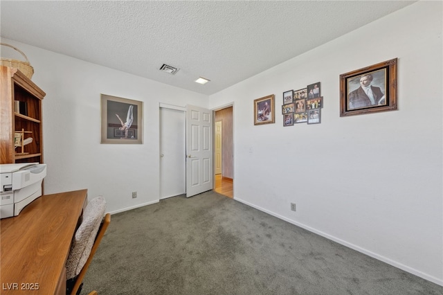 22 Jade Cir, Las Vegas, NV 89106 - unfurnished office featuring carpet flooring, baseboards, and a textured ceiling