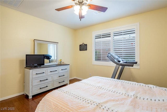 7611 Redcloud Peak St, Las Vegas, NV 89166 - bedroom featuring baseboards, dark wood-type flooring, and ceiling fan